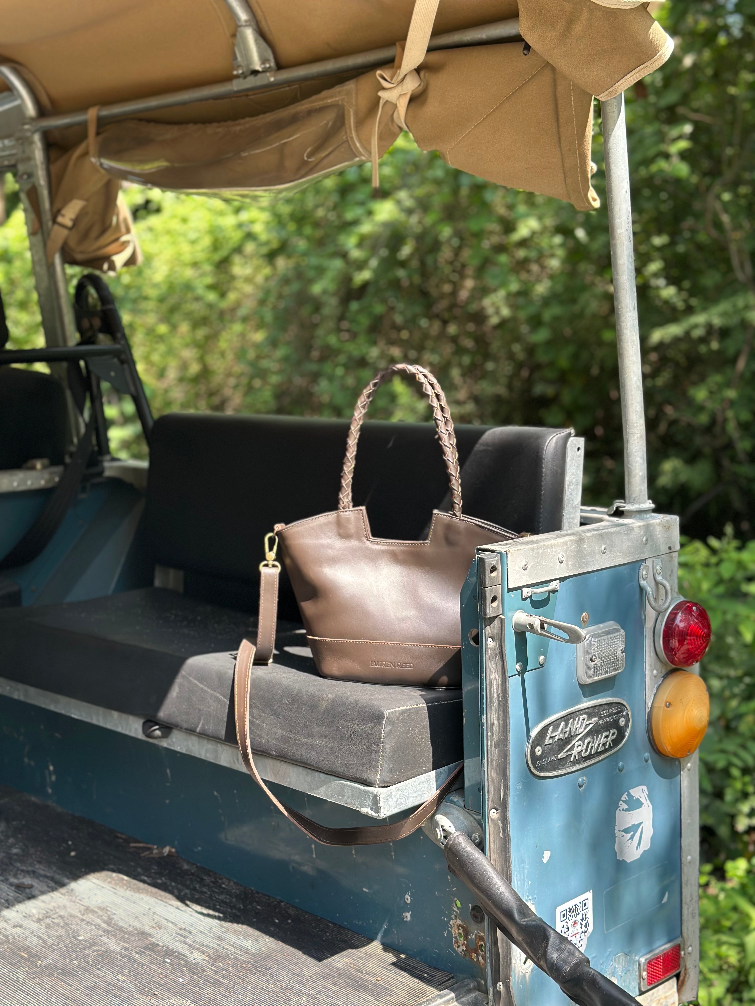 Leather Crossbody Purse on Vintage Land Rover.