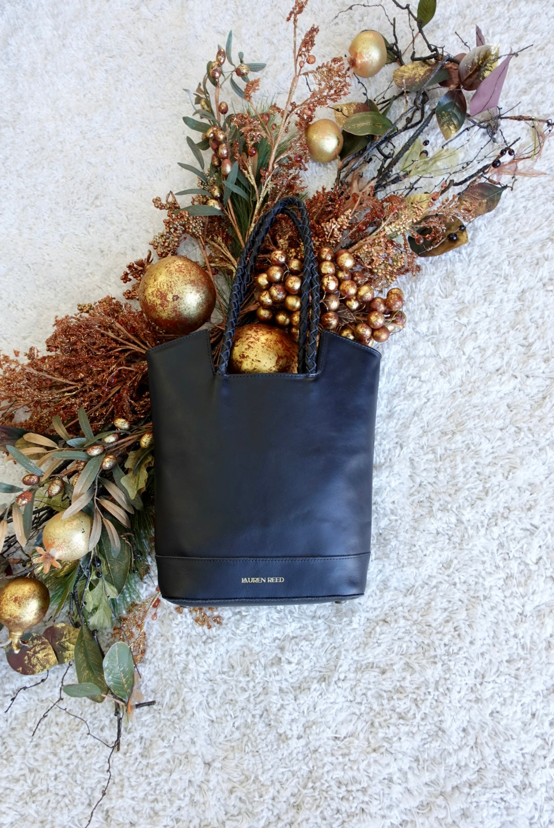 Black leather tote bag purse with winter decor