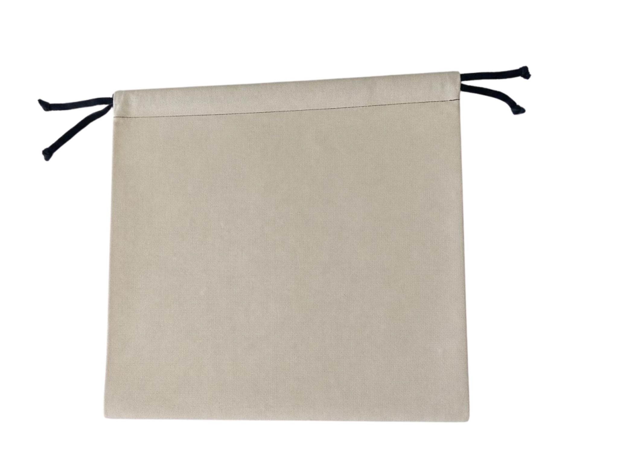 Beige drawstring dust bag with black strings on a white background