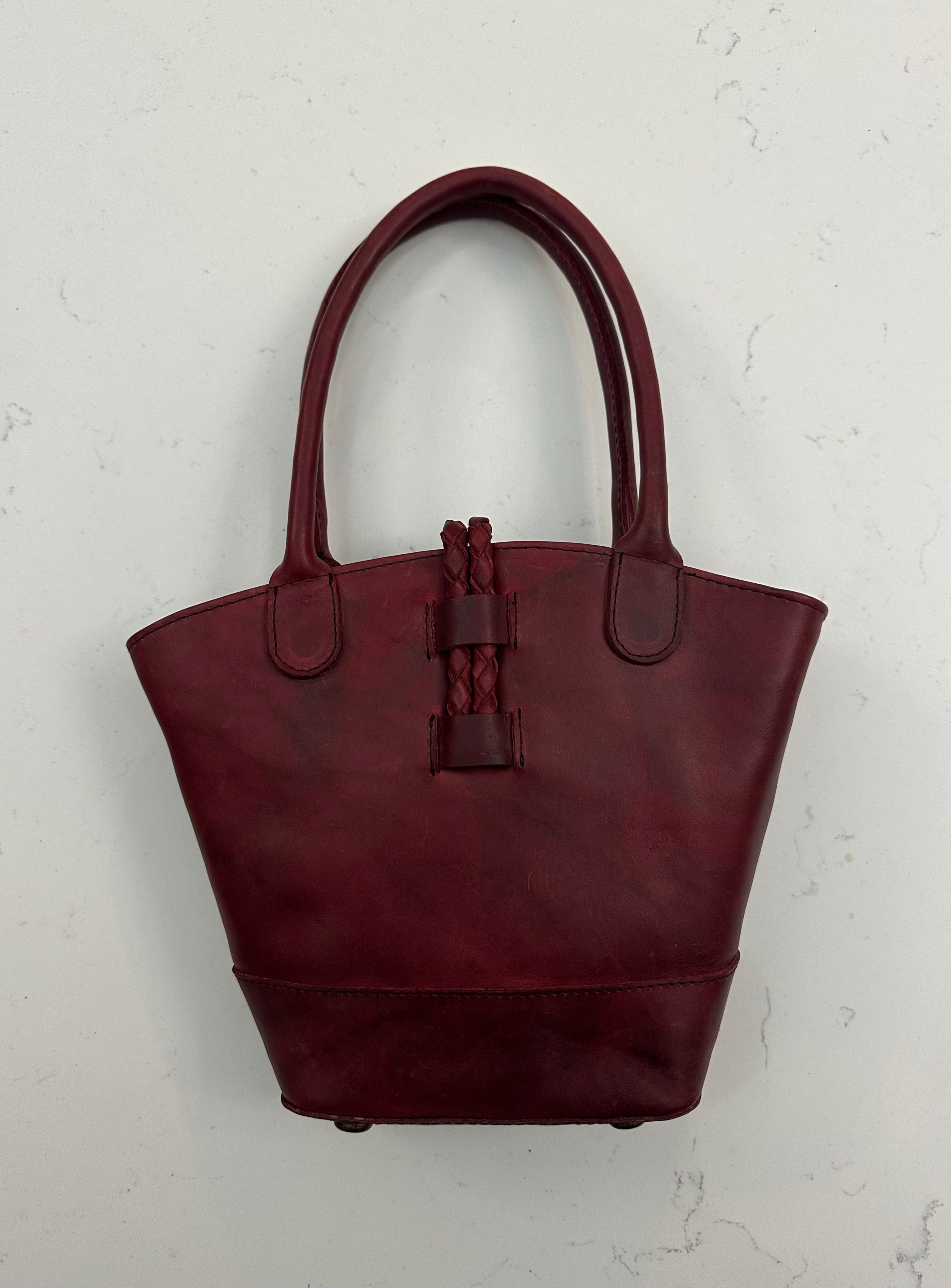 Red handbag on a light background