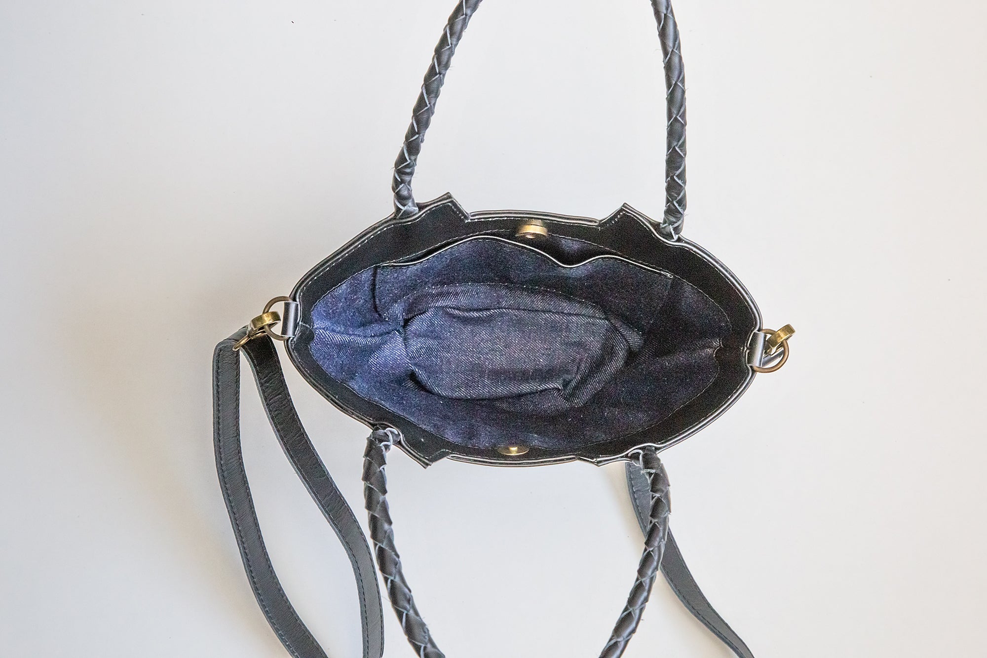 Interior shot of Lauren Reed Co Mini Carmen Crossbody with upcycled sustainable denim jean lining