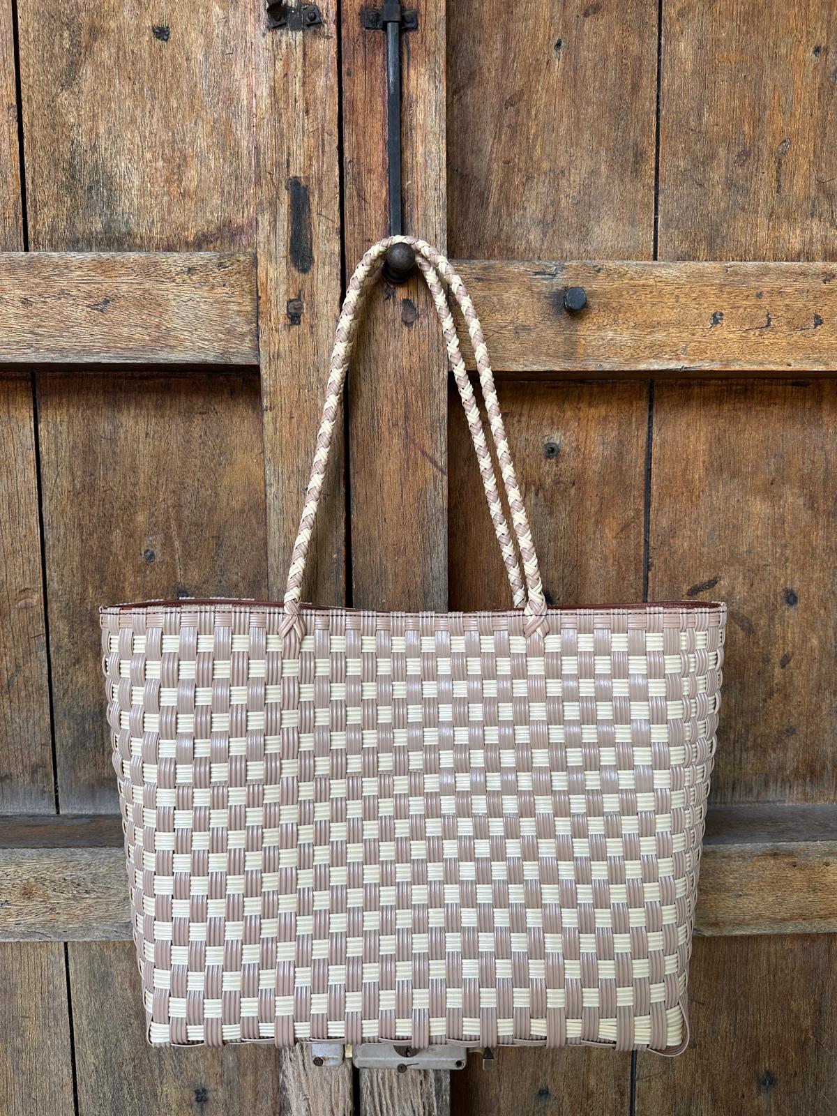 Tan and cream handwoven upcycled beach tote bag with leather trim by Lauren Reed Co.