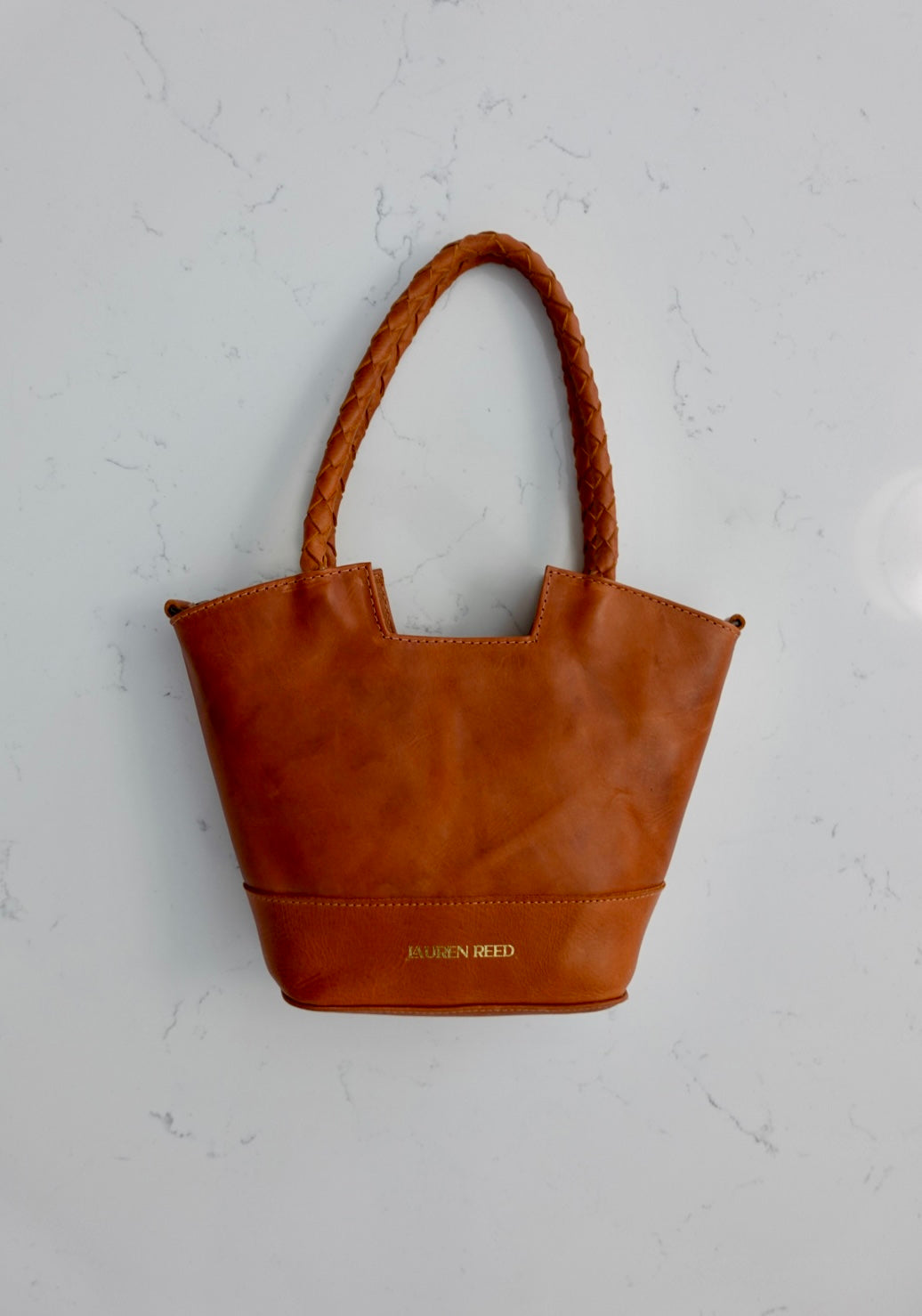 Tan leather purse braided straps