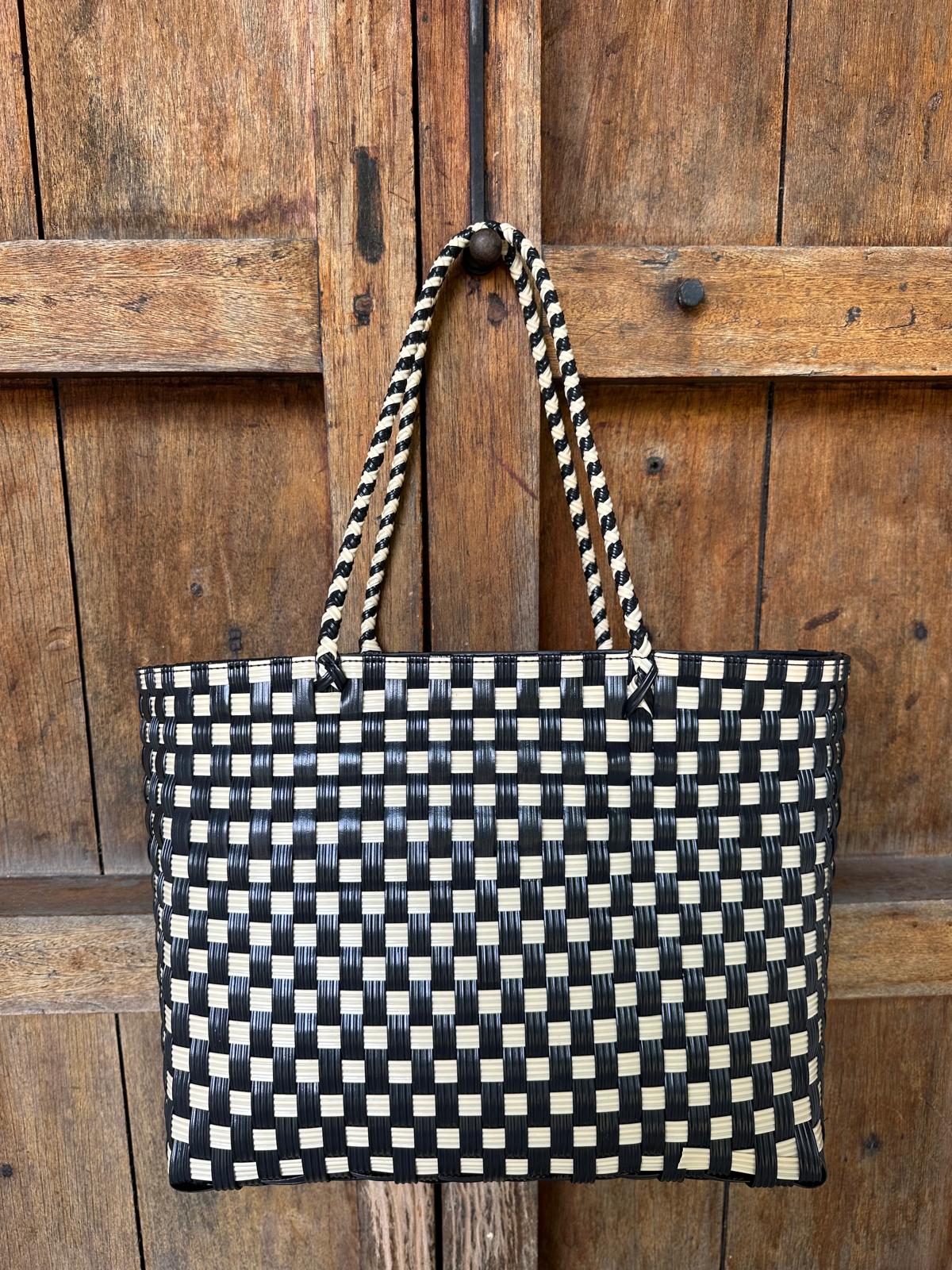 Black and cream handwoven upcycled beach tote bag with leather trim by Lauren Reed Co.