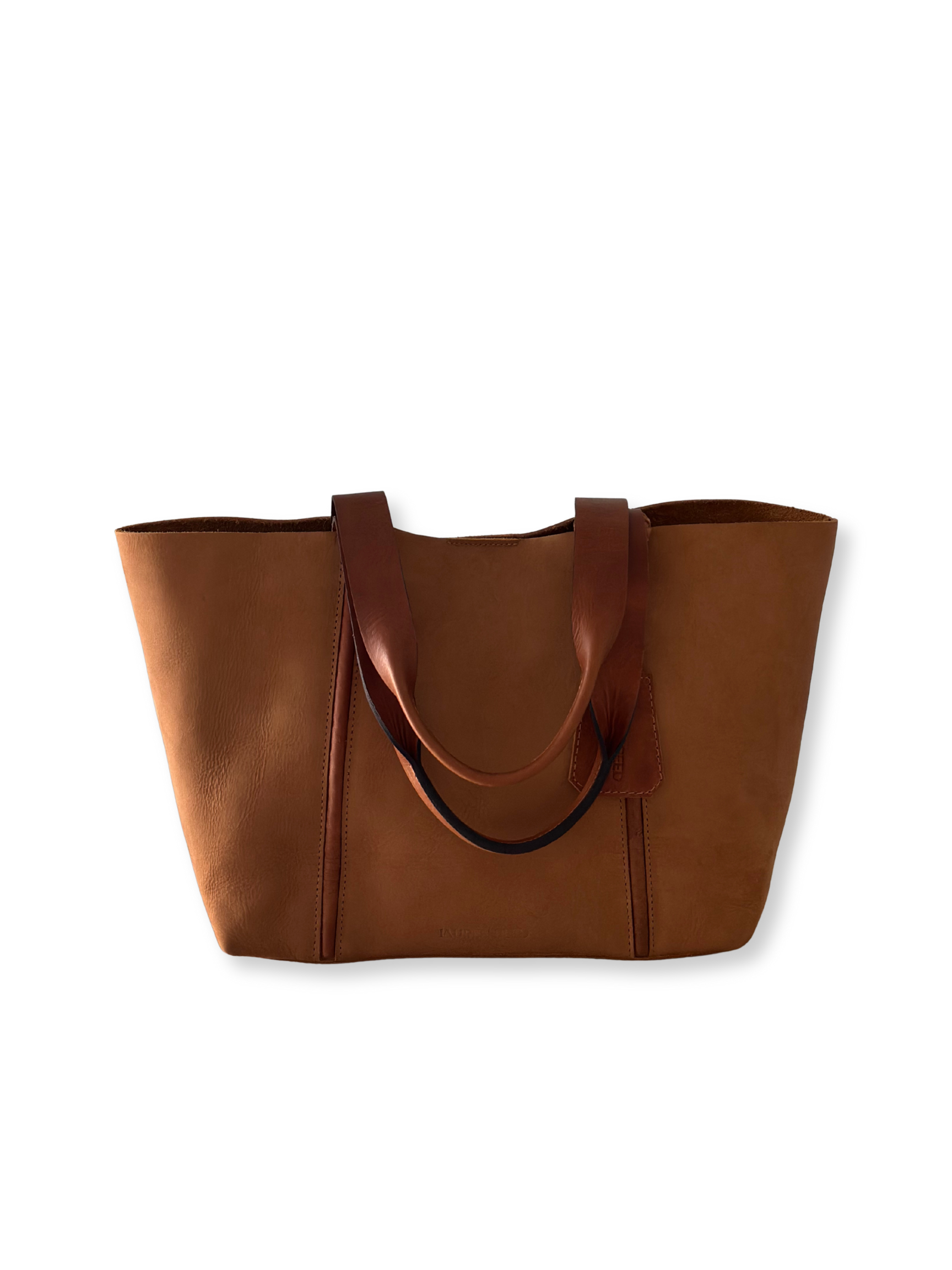 Leather tote bag on a white background